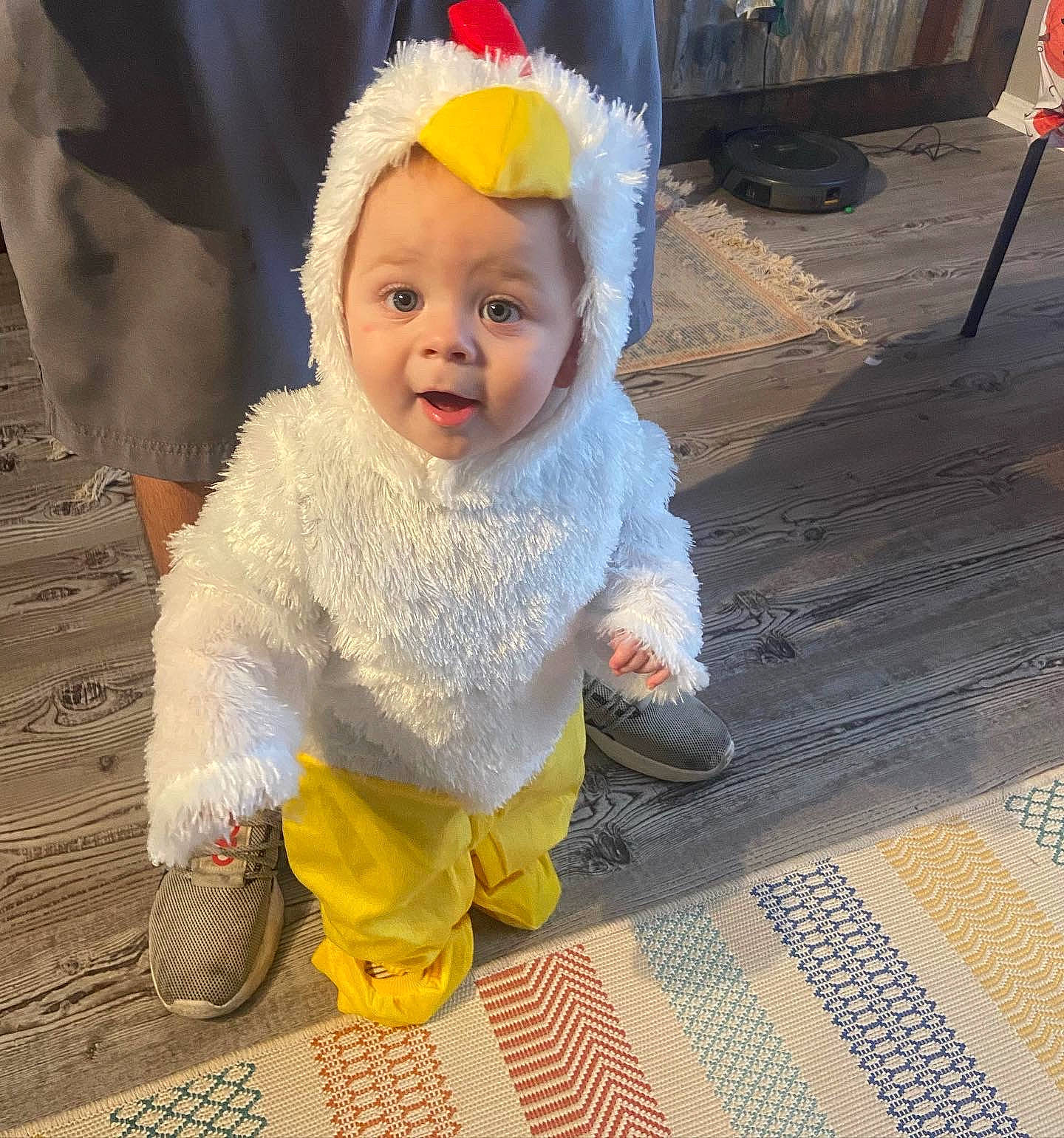 Daxton is registered to the contest to win money with this photo: baby, baby_toddler_clothing, cap, cheek, child, costume_hat, eye, flag, flooring, fun, fur, happy, headband, pattern, person, road_surface, sitting, sleeve, smile, surprise