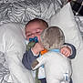 Ariano participe au concours pour gagner de l'argent avec cette photo : baby, infant, pacifier, stuffed_toy, plush_toy, blanket, pillow, bed, bedding, sleeping, hand, manicure, pajamas, onesie, pacifier_clip, indoor, cute, adorable, soft_texture, peaceful