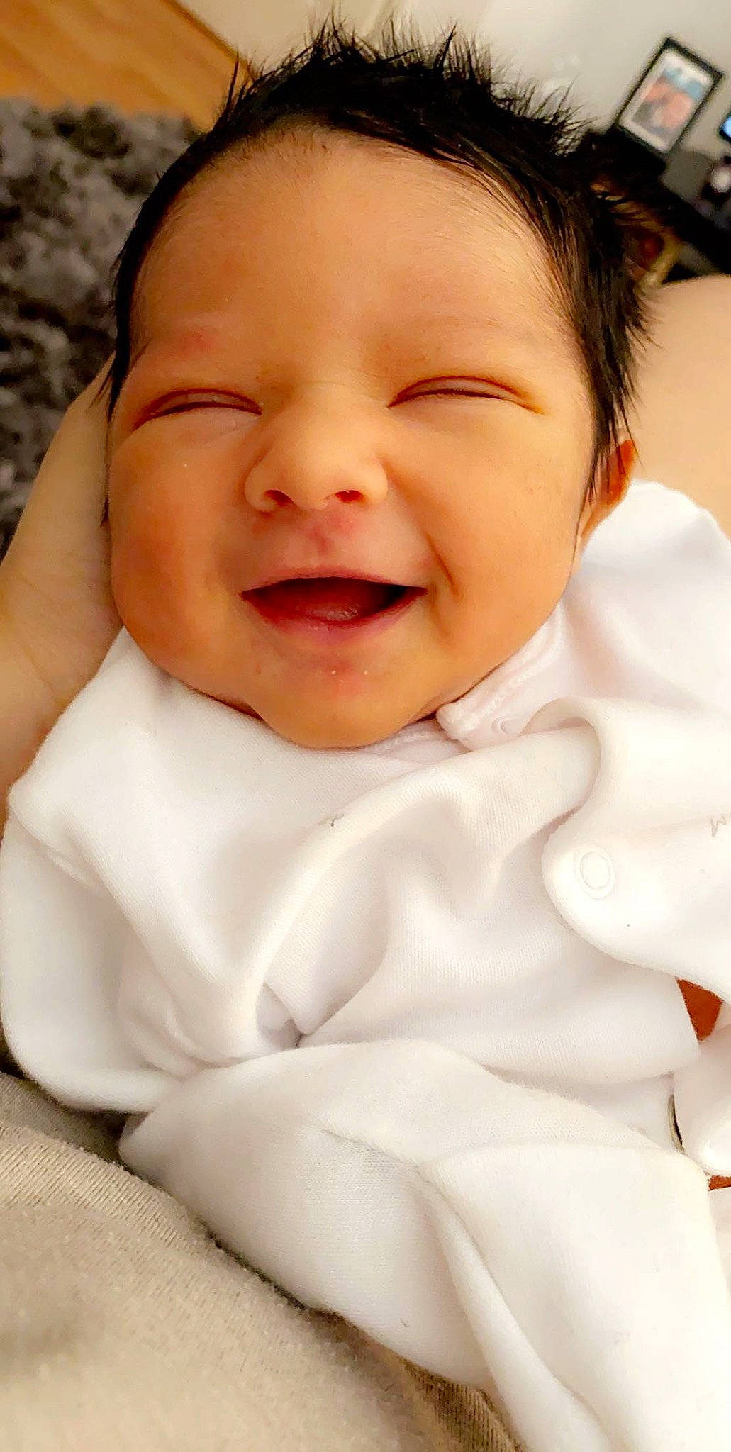 Jayan is registered to the contest to win money with this photo: baby, baby_making_funny_faces, cheek, child, chin, face, facial_expression, happy, head, laugh, lip, mouth, nose, person, portrait_photography, skin, smile, toddler