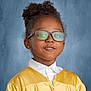 Nicholas joined the competition — help win amazing prizes! child, glasses, yellow_gown, graduation, portrait, smile, face, person, school_photo, studio_background, young, happy, black_hair, curly_hair, clothing, formal, education, celebration, indoors, photography