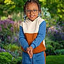 Nicholas joined the competition — help win amazing prizes! child, smiling, glasses, braided_hair, hoodie, pants, outdoor, garden, greenery, flowers, nature, portrait, happy, person, standing, casual_clothing, daylight, young, cute, friendly