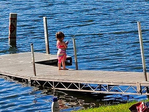Darla joined the competition — help win amazing prizes! boat, boating, boats_and_boating_equipment_and_supplies, dock, fun, lake, leisure, marina, nonbuilding_structure, person, pier, recreation, under_exposed, vacation, vehicle, water, water_transportation
