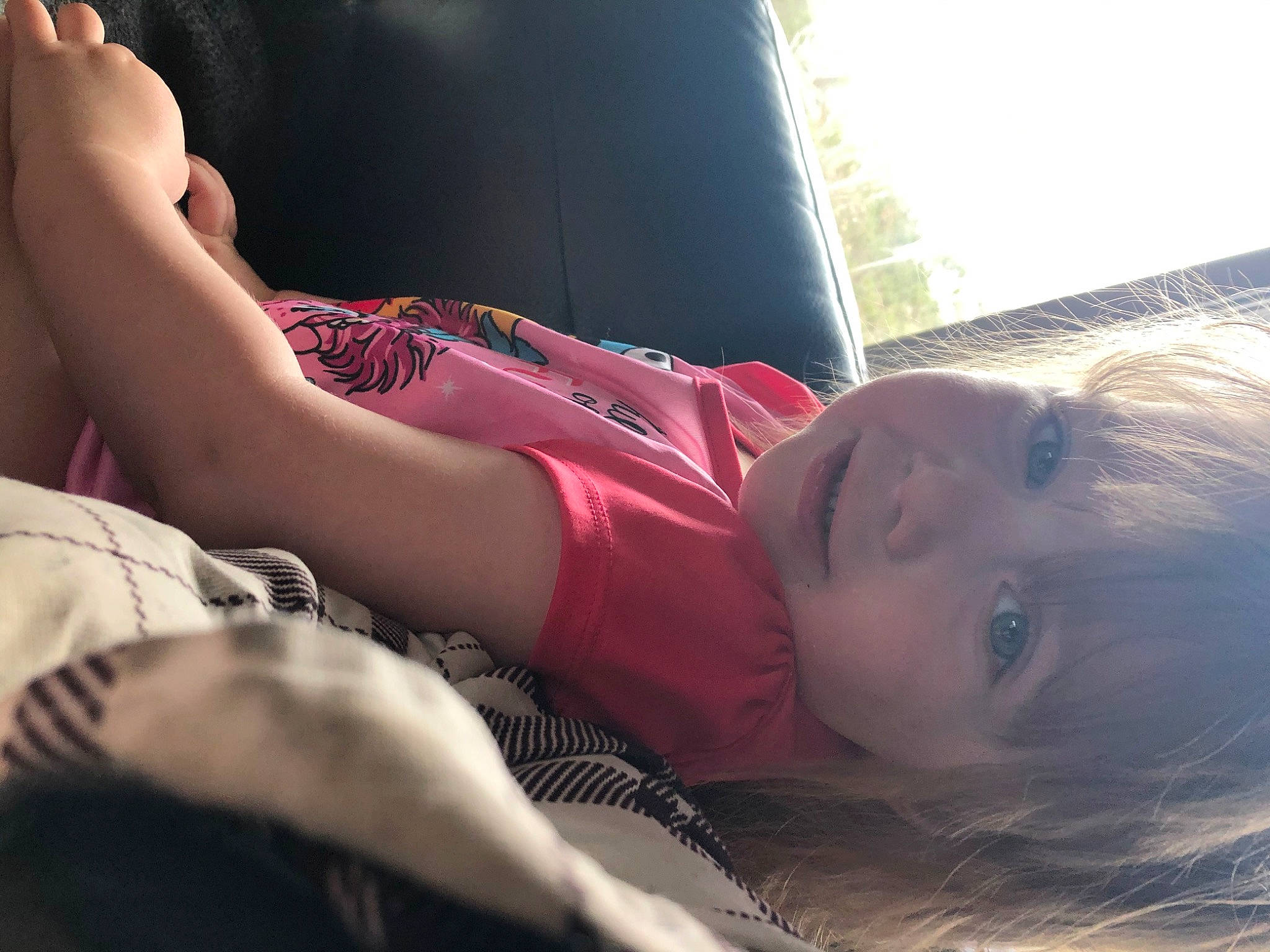 Darla is registered to the contest to win money with this photo: arm, baby, beauty, child, cloud, hand, human, leg, light, lip, morning, mouth, nap, nose, person, selfie, skin, sky, sleep, sunlight