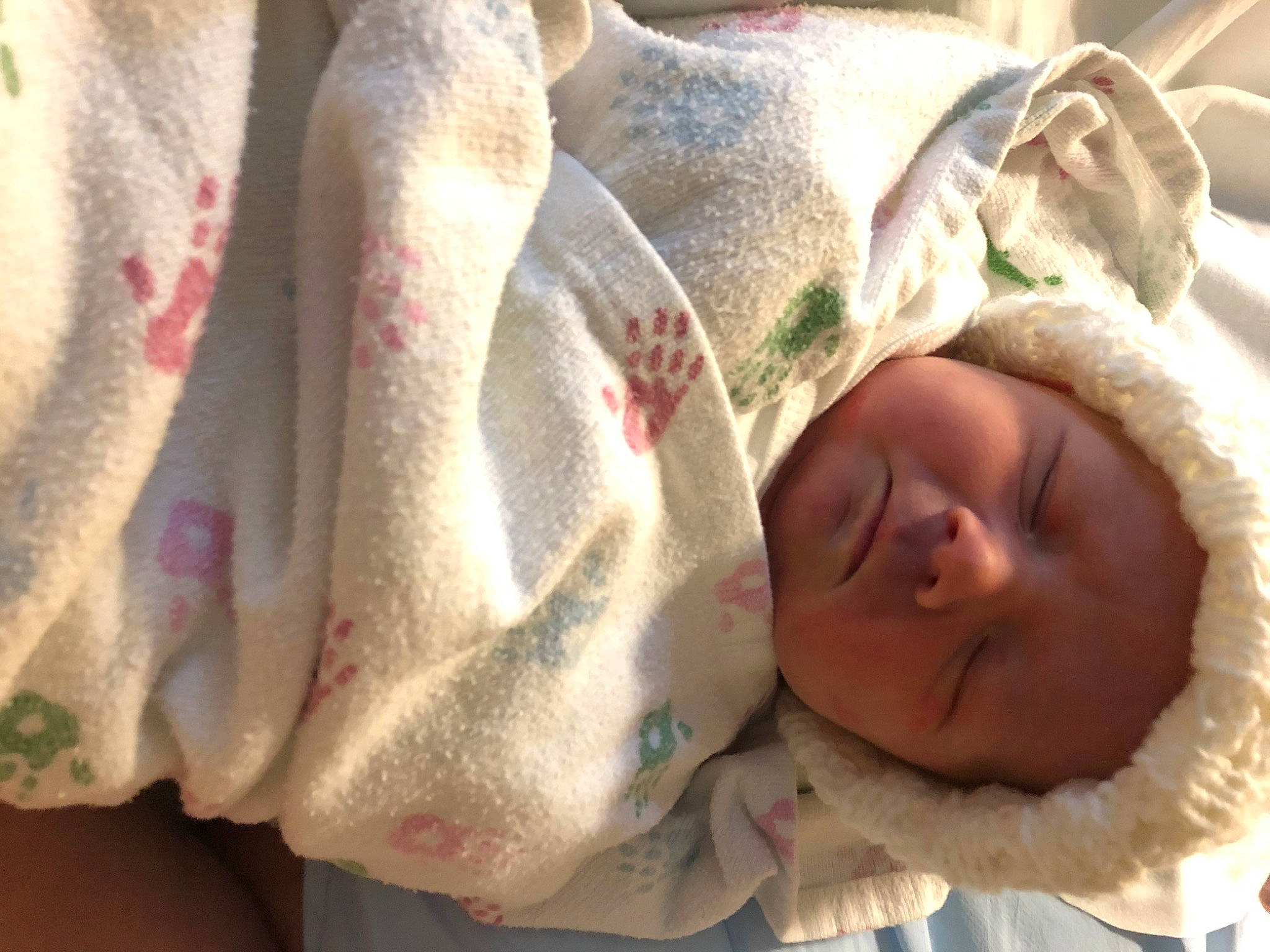 Joshua is registered to the contest to win money with this photo: baby, child, headwear, linens, person, product, toddler