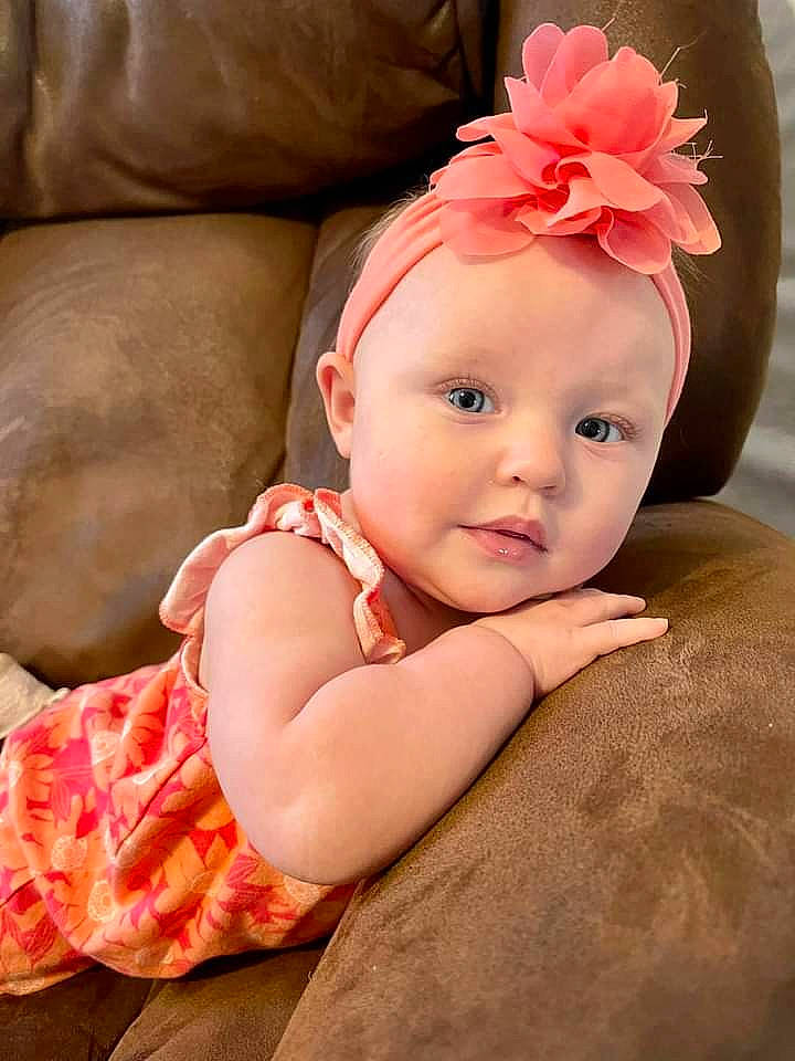 Elsie joined the competition — help win amazing prizes! baby, baby_toddler_clothing, cheek, child, comfort, costume_hat, dress, eyelash, flash_photography, happy, headband, headpiece, jewellery, lip, pattern, peach, person, petal, pink, skin