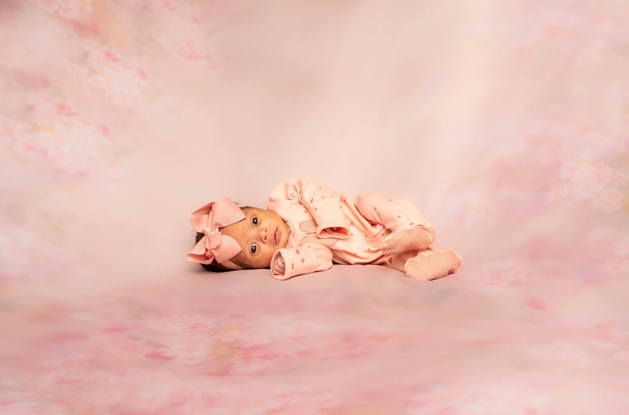 Emi is registered to the contest to win money with this photo: barefoot, dress, fawn, flash_photography, flooring, foot, gesture, grass, happy, headwear, human_body, human_leg, leg, nail, peach, person, petal, rose, rose_family, sitting