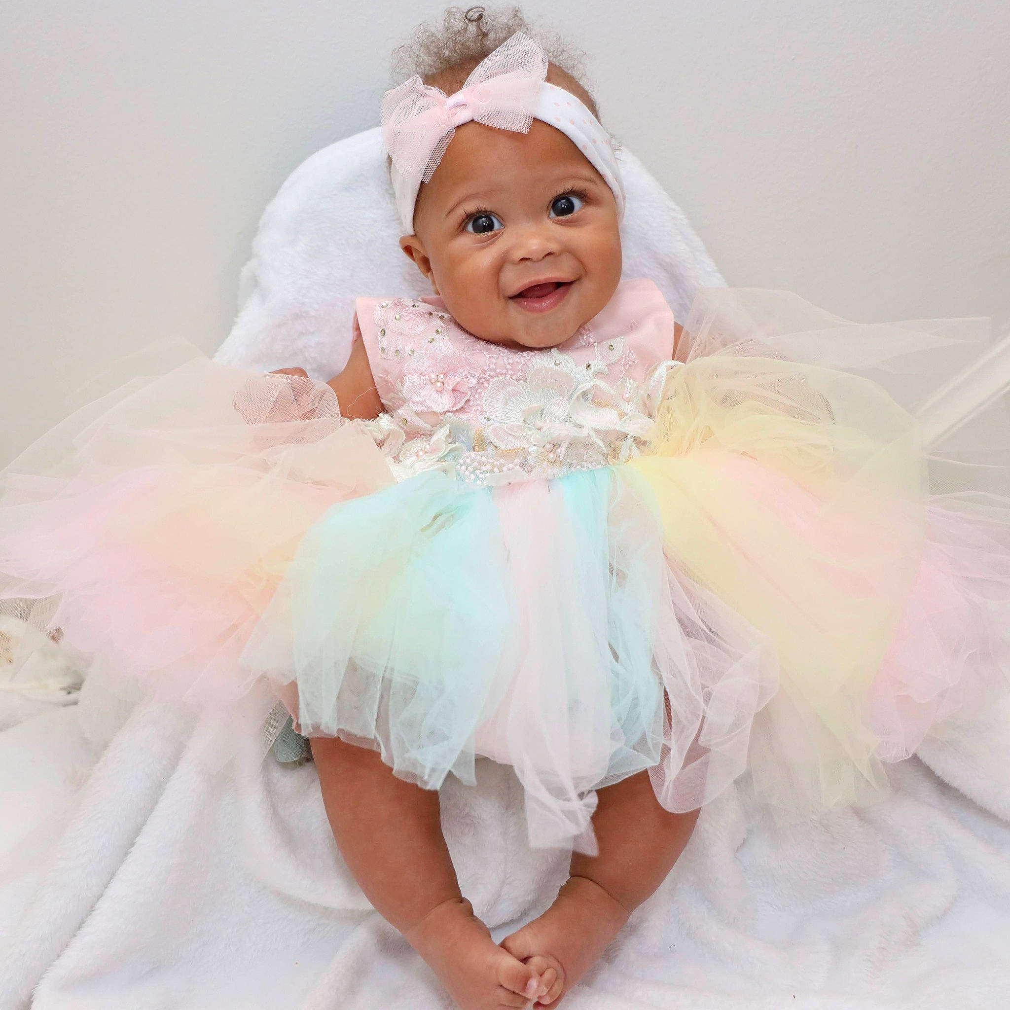 Emi joined the competition — help win amazing prizes! baby, baby_toddler_clothing, beauty, bridal_accessory, dress, embellishment, face, facial_expression, happy, head, headgear, headpiece, iris, joy, mythical_creature, person, pink, product, skin, smile