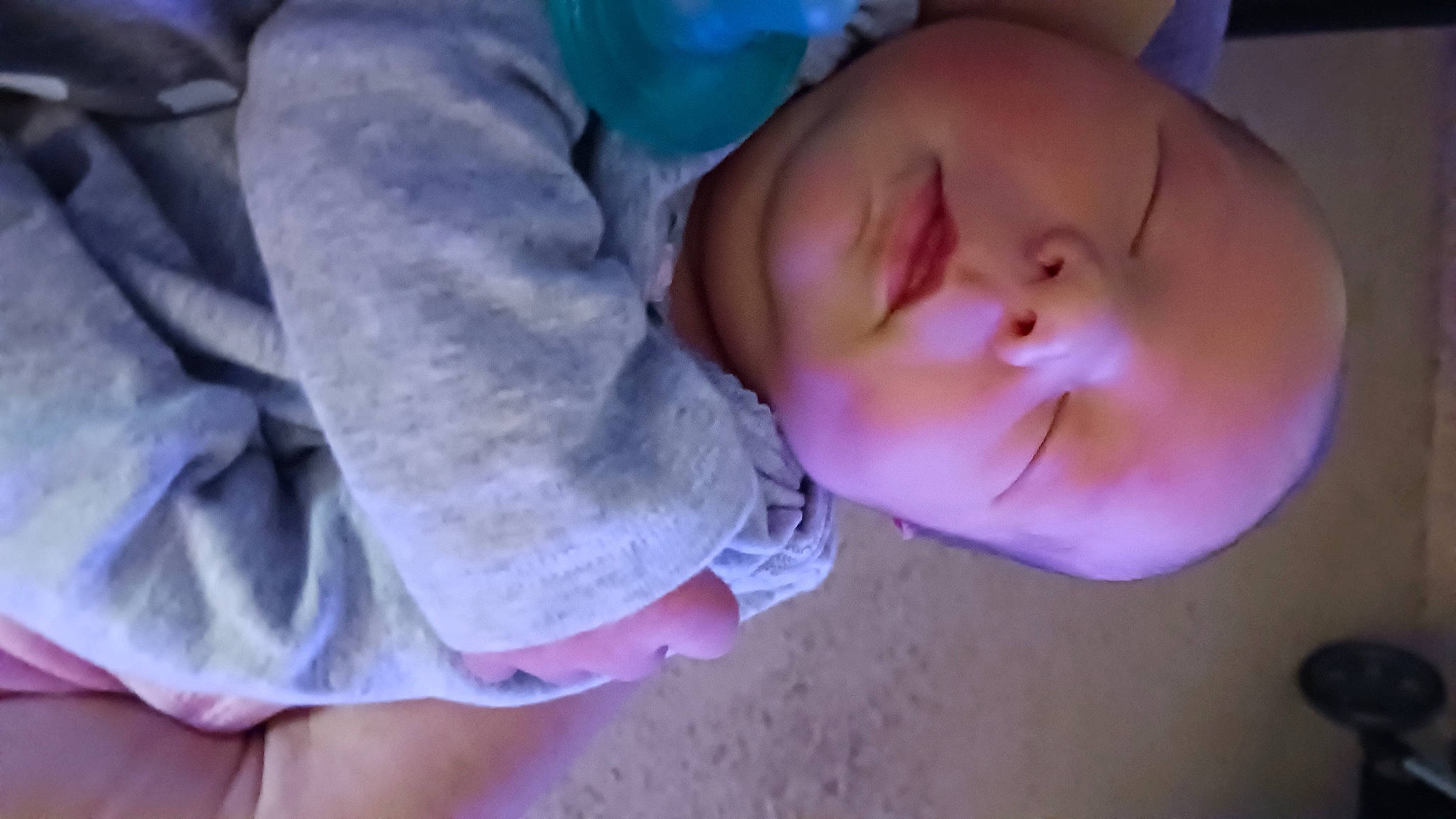 Abigail is registered to the contest to win money with this photo: baby, baby_toddler_clothing, bedtime, cheek, child, comfort, finger, fun, gesture, happy, human_body, iris, mouth, nose, person, pink, purple, skin, sleep, sleeve