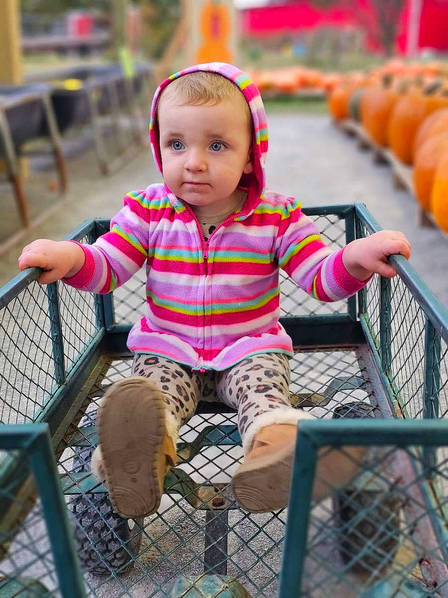 Ella joined the competition — help win amazing prizes! baby_toddler_clothing, beauty, chair, child, city, facial_expression, fun, grass, happy, human, human_settlement, leisure, person, product, public_space, recreation, shopping_cart, skin, sleeve, standing