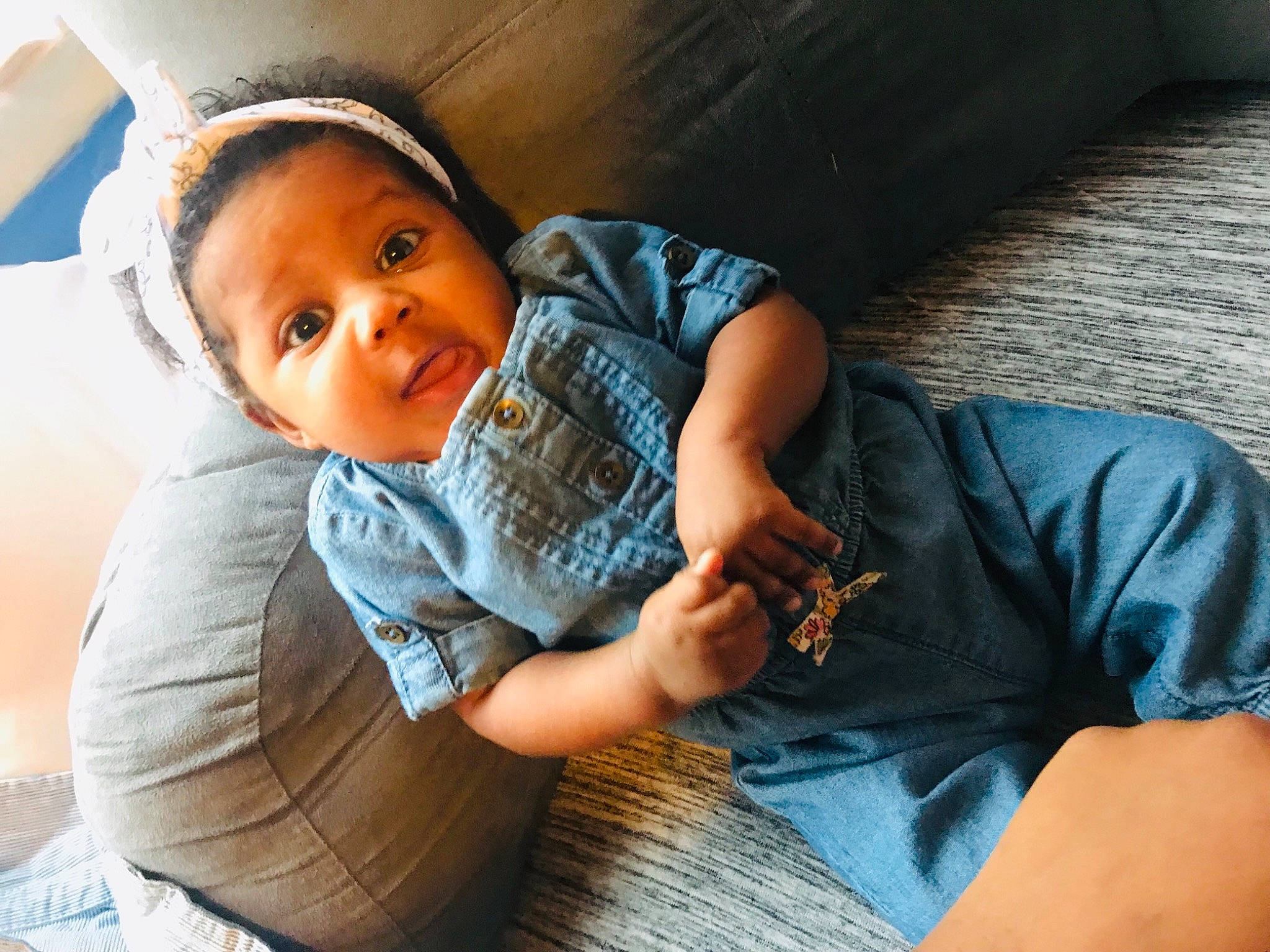 Kynnedi is registered to the contest to win money with this photo: arm, baby, cheek, child, hand, person, sitting, smile, toddler