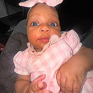 Harmony is registered to the contest to win money with this photo: baby, infant, child, pink_dress, headband, bow, hand, face, eyes, skin, cute, portrait, indoor, person, clothing, gown, newborn, expression, closeup, human