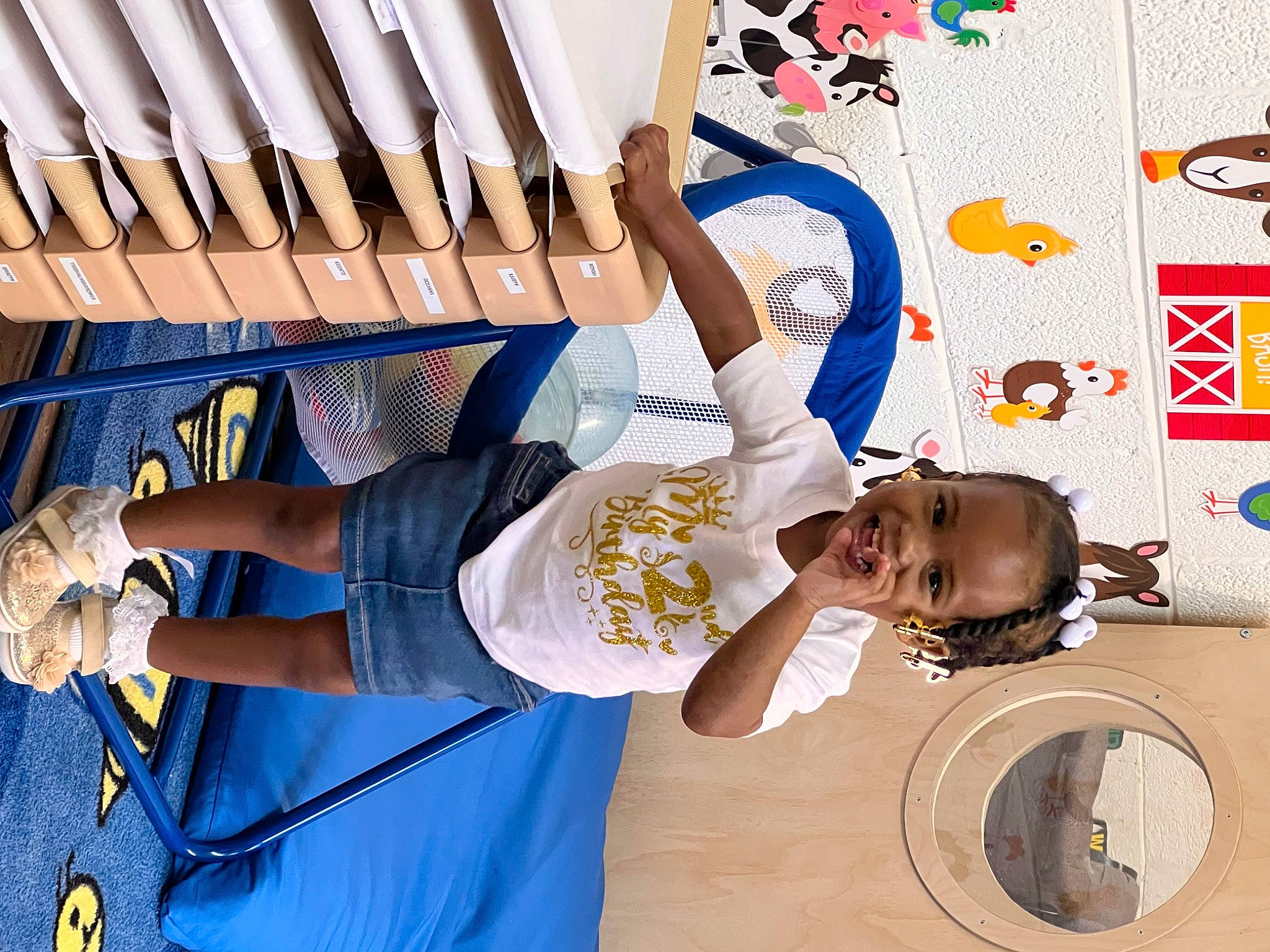 Novah is registered to the contest to win money with this photo: arm, automotive_tire, child, circle, elbow, electric_blue, fun, happy, hat, human_leg, leisure, person, recreation, sandal, shorts, smile, t_shirt, thigh, toddler, walking_shoe