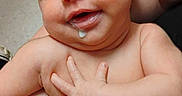 Lydia is registered to the contest to win money with this photo: baby, infant, drool, sleeping, smile, hand, skin, person, holding, arm, cute, newborn, child, face, bare_chest, closeup, happy, resting, human, toddler