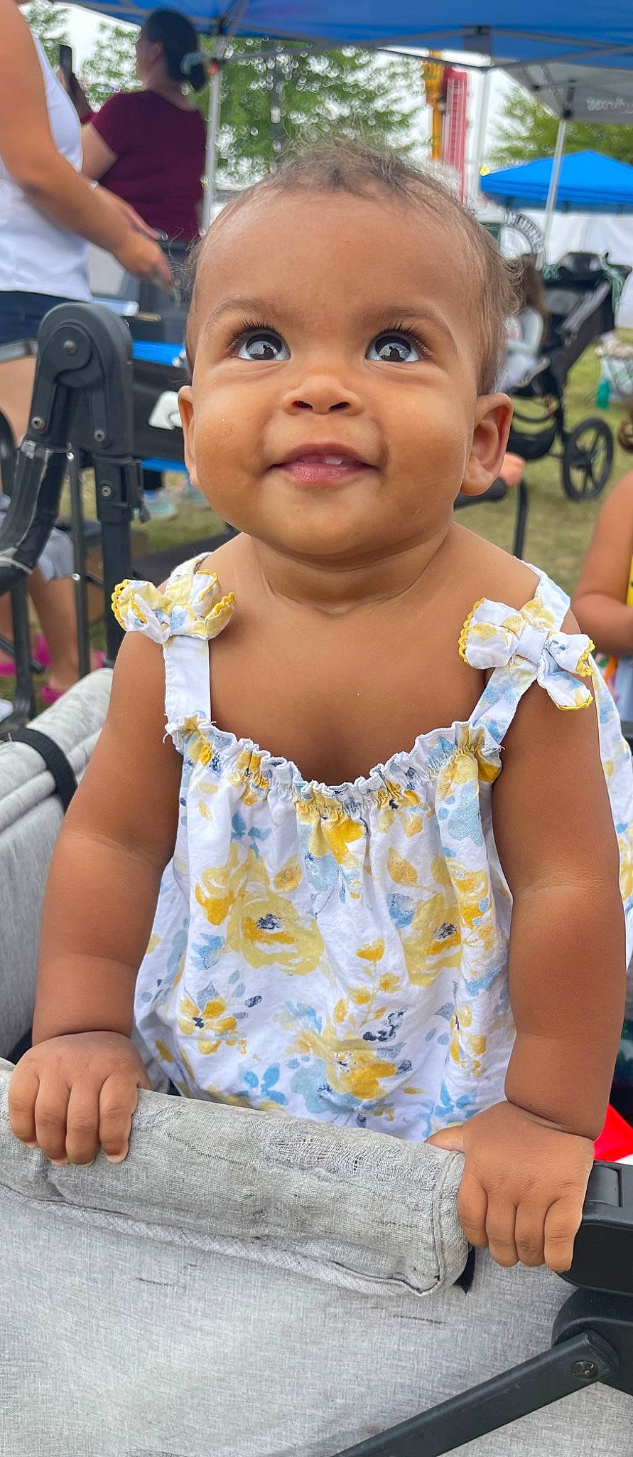 Lenyx is registered to the contest to win money with this photo: baby, baby_toddler_clothing, chair, cheek, child, event, facial_expression, finger, fun, hairstyle, happy, joy, leisure, people, person, recreation, sitting, skin, smile, summer