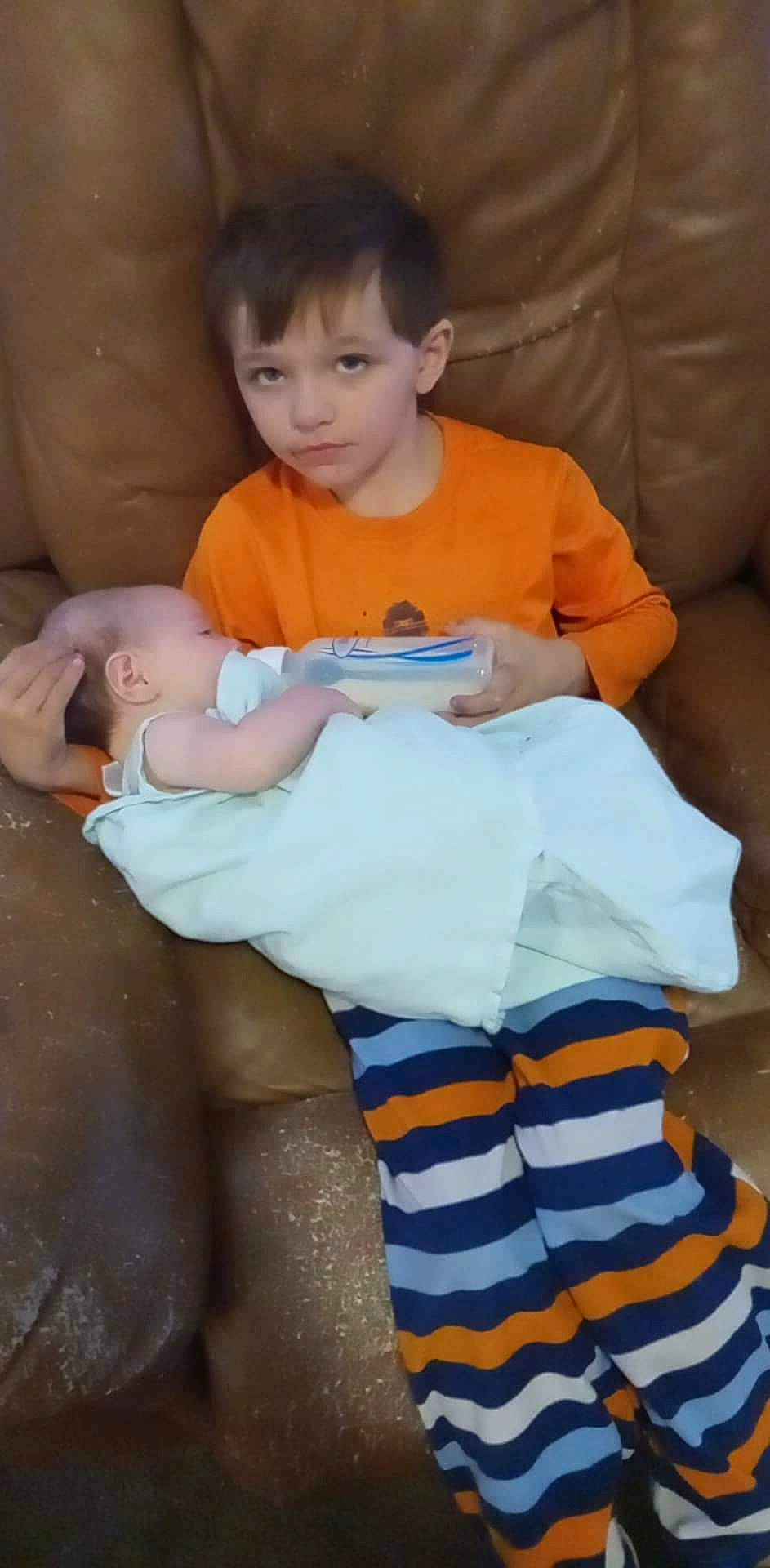 Seth joined the competition — help win amazing prizes! baby, baby_toddler_clothing, child, comfort, elbow, fun, happy, head, human_leg, knee, lap, person, product, sitting, skin, sleeve, sock, t_shirt, thigh, toddler