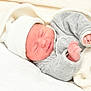 Logan participe au concours pour gagner de l'argent avec cette photo : baby, blanket, child, close_up, cozy, cute, gray_clothing, hat, indoors, infant, newborn, peaceful, portrait, resting, sleep, sleeping, small_hands, soft_texture, warm, wrapped