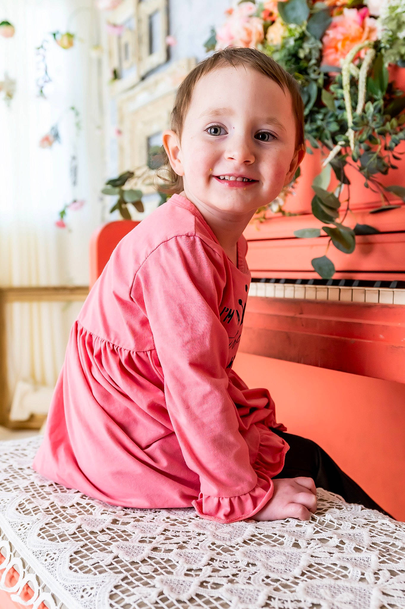 Rias is registered to the contest to win money with this photo: event, face, flooring, flower, happy, head, human_body, joy, magenta, peach, person, pink, plant, red, rose, sitting, skin, sleeve, smile, textile