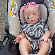 Paisley joined the competition — help win amazing prizes! baby, infant, stroller, striped_clothing, child, cute, face_stickers, hearts, flowers, cartoon_characters, outdoor, pavement, warning_labels, legs, feet, hands, seat, safety, person, casual