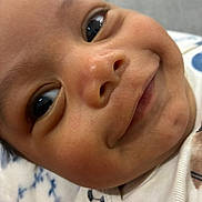 Amari joined the competition — help win amazing prizes! baby, close_up, face, smile, child, eyes, skin, cute, infant, expression, portrait, young, happy, clothing, white, texture, cheeks, nose, mouth, person