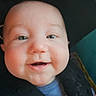 Dean joined the competition — help win amazing prizes! baby, child, face, smile, blue_shirt, car_seat, straps, close_up, cute, infant, happy, person, head, skin, eyes, mouth, cheeks, indoors, seatbelt, clothing