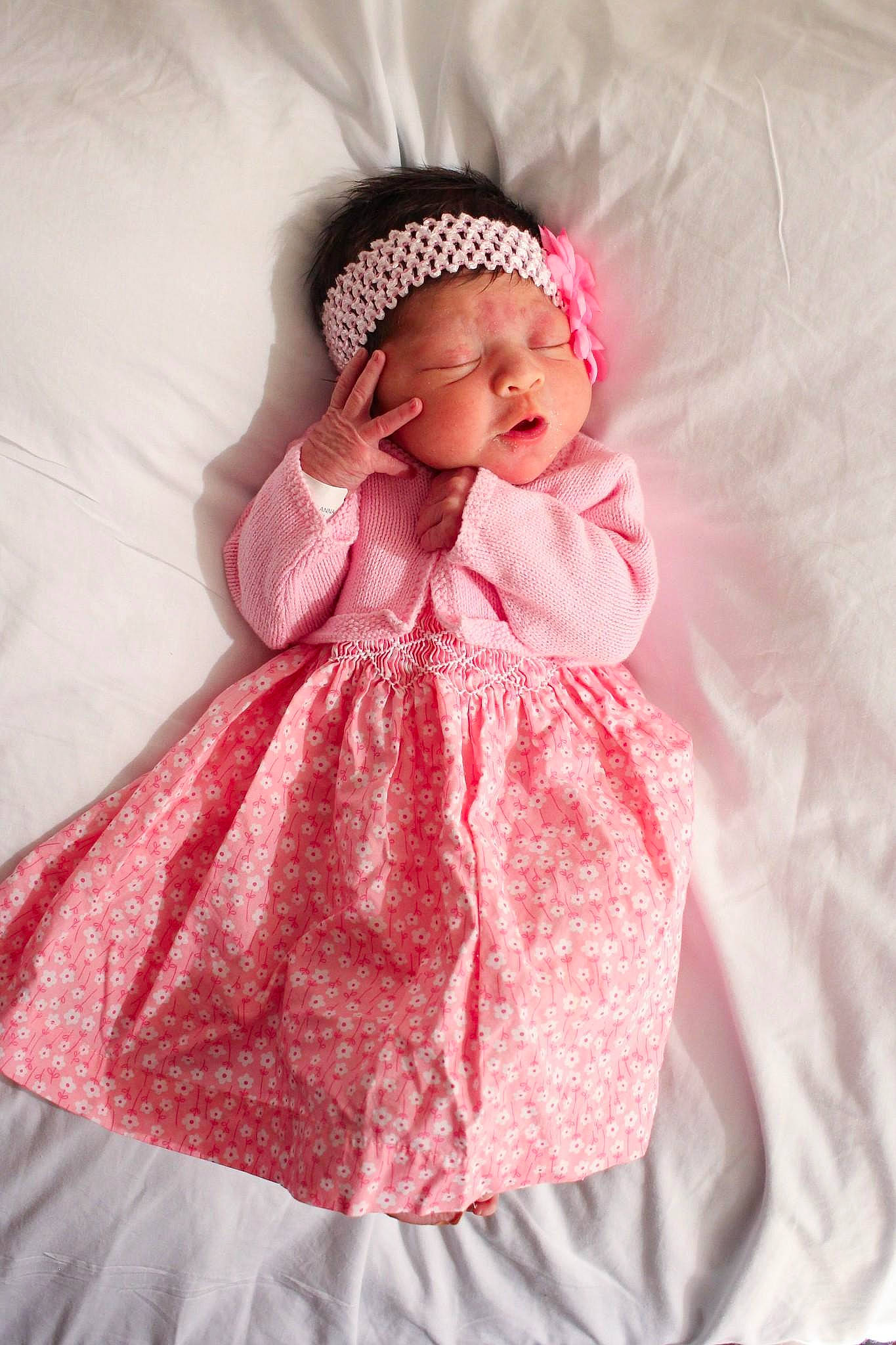 Rosy joined the competition — help win amazing prizes! baby, baby_toddler_clothing, beauty, day_dress, dress, embellishment, face, fashion_design, happy, headgear, headwear, linens, magenta, one_piece_garment, pattern, peach, person, pink, sleeve, smile