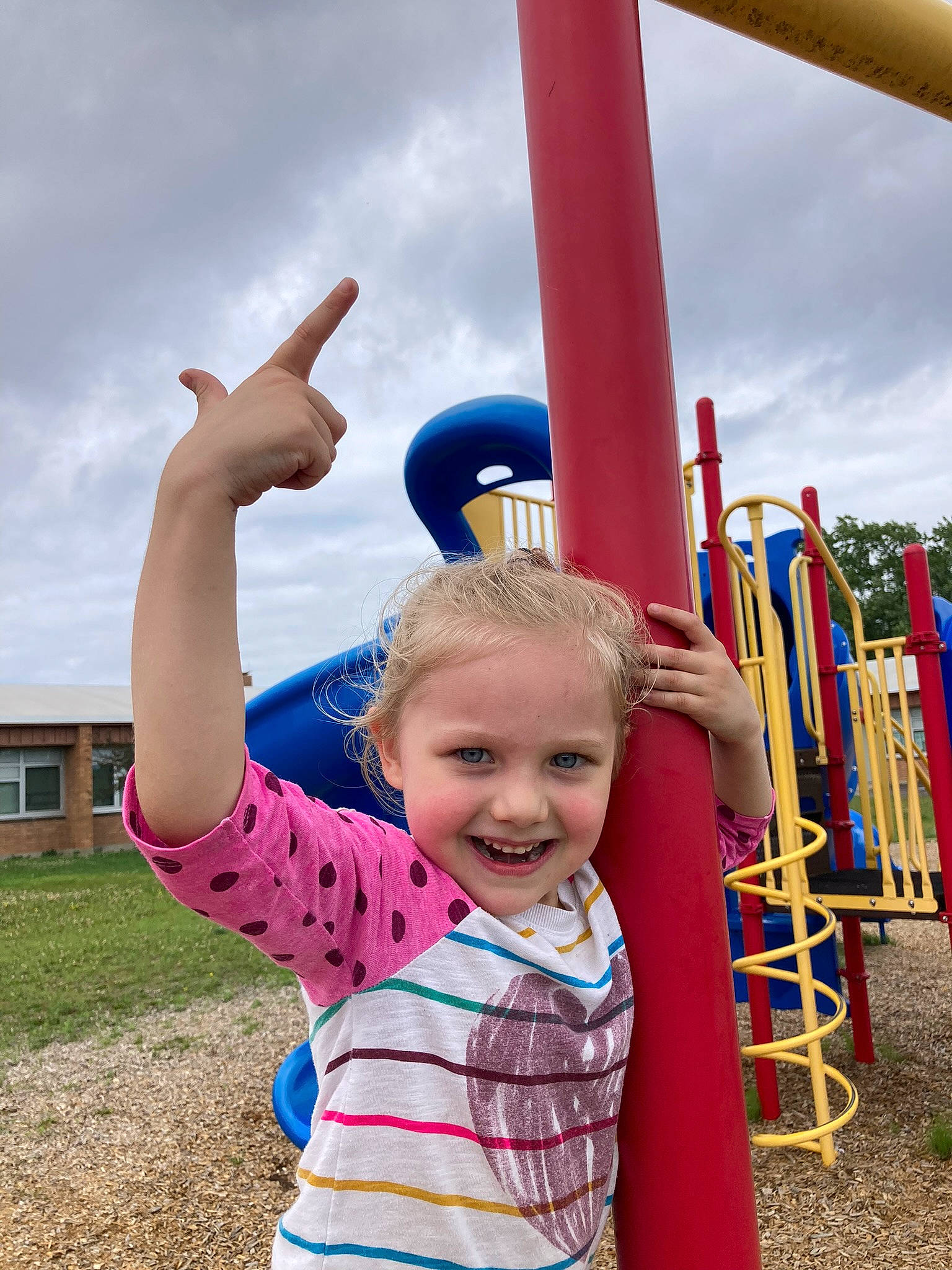 Karmyn joined the competition — help win amazing prizes! baby_toddler_clothing, child, chute, city, cloud, fun, gesture, grass, happy, joy, leisure, outdoor_play_equipment, people_in_nature, person, play, playground, recreation, sky, sleeve, smile