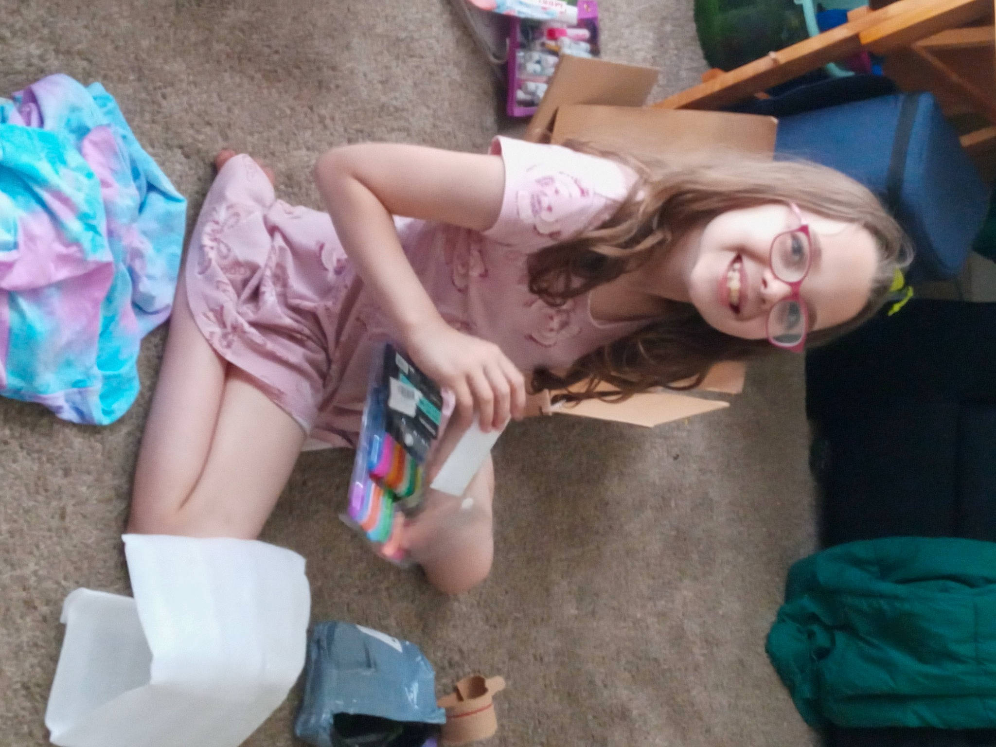 Kaycee joined the competition — help win amazing prizes! chest, child, eyewear, finger, fun, happy, human_leg, joint, joy, knee, leisure, person, play, shorts, sitting, smile, soil, summer, t_shirt, thigh