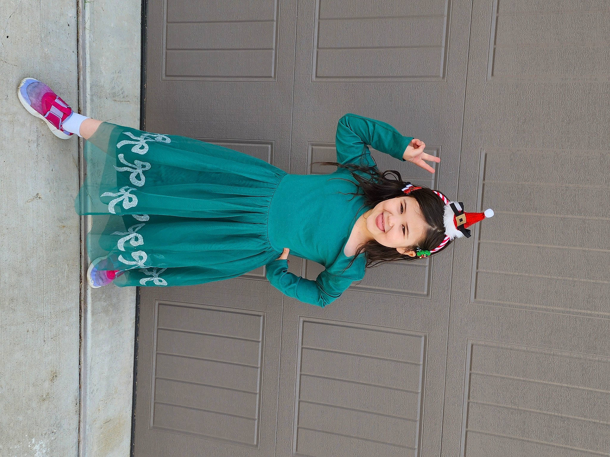 Leah is registered to the contest to win money with this photo: boot, costume, door, dress, electric_blue, hat, human_leg, joy, magenta, person, plant, shoe, smile