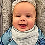 baby, babylaughing, bodypart, clothing, coat, cushion, face, furniture, happy, hat, head, homedecor, jacket, laughing, mouth, person, photography, portrait, smile, teeth