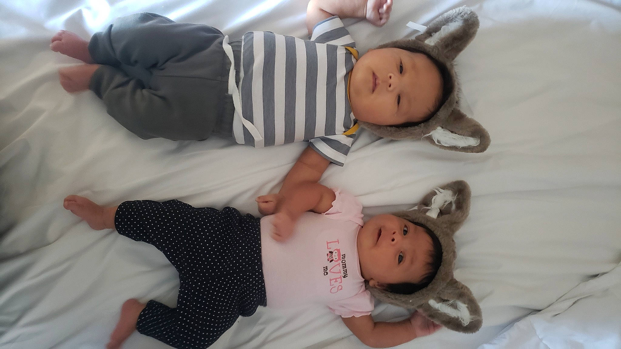 Kaia joined the competition — help win amazing prizes! baby, baby_products, baby_toddler_clothing, bed, cheek, child, comfort, finger, gesture, head, human_body, joint, linens, person, room, skin, sleeve, textile, thumb, toddler