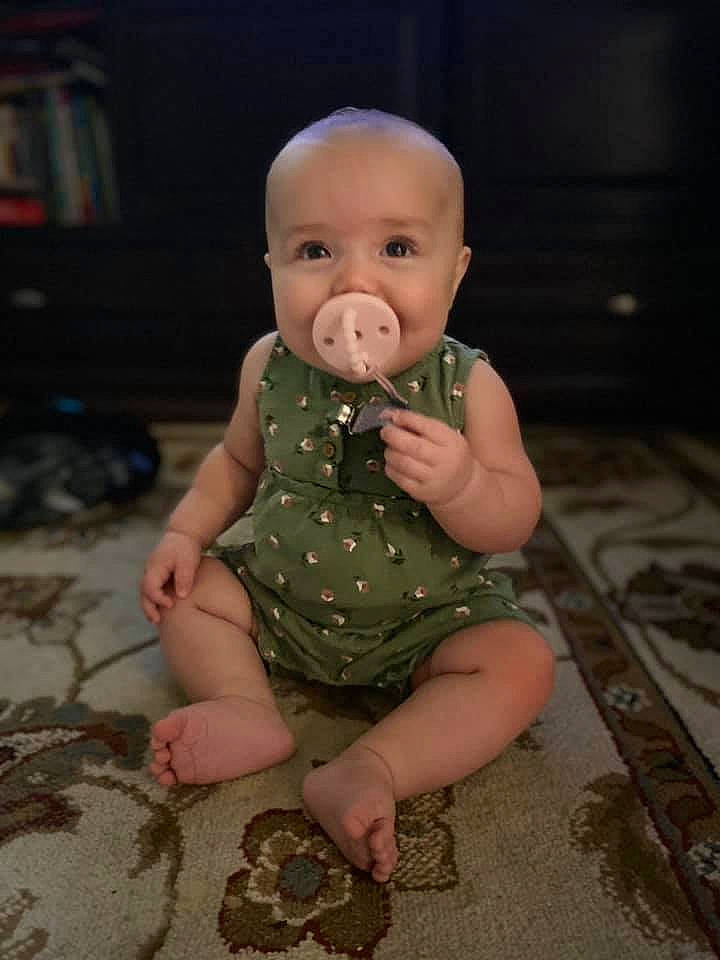 Joann is registered to the contest to win money with this photo: baby, baby_toddler_clothing, cheek, eye, flash_photography, floor, flooring, foot, fun, hand, happy, head, human_body, iris, nail, nose, person, sleeve, thumb, toddler