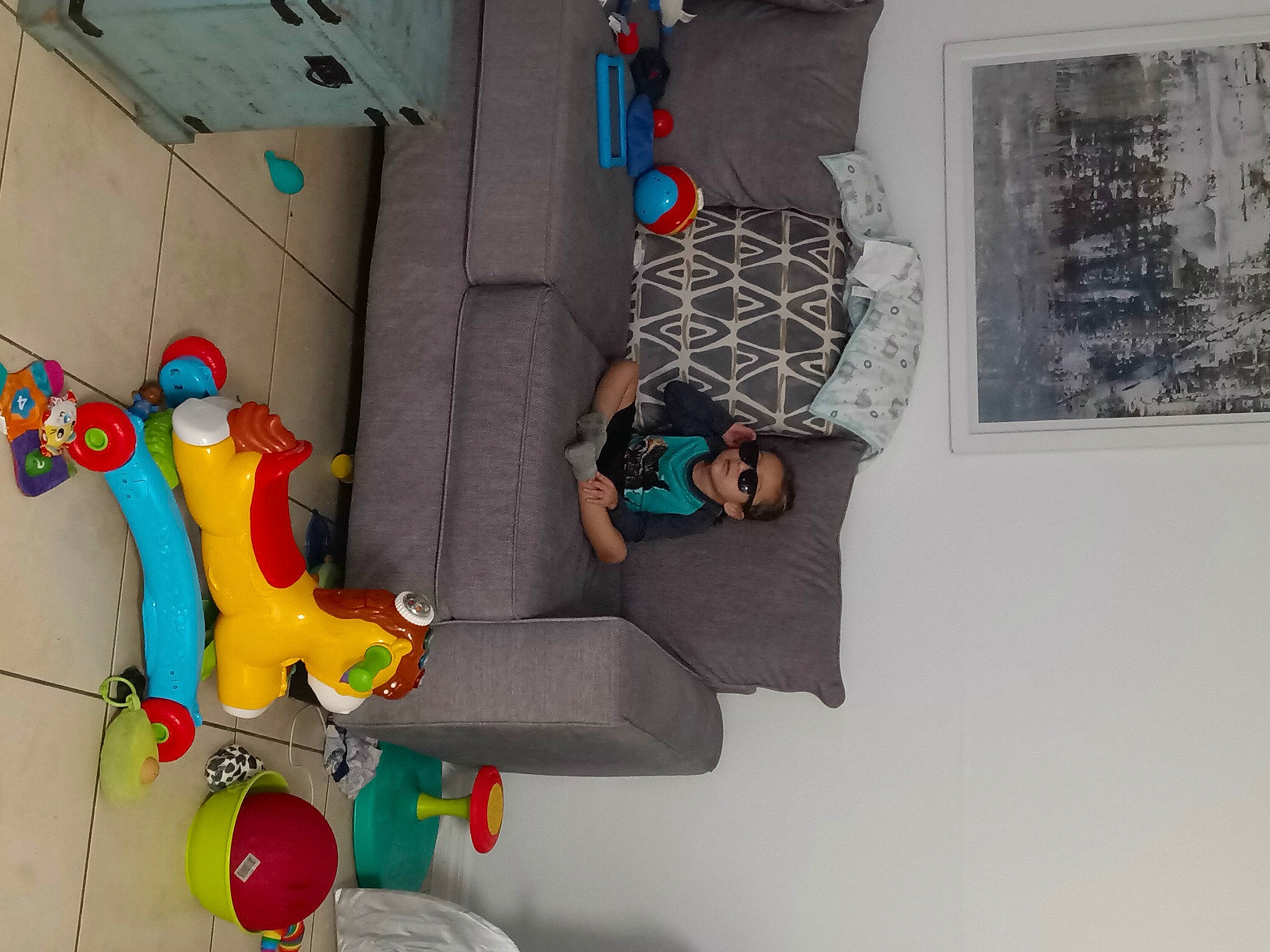 Kayden is registered to the contest to win money with this photo: adventure, art, climbing, concrete, fun, leisure, modern_art, pattern, person, plastic, recreation, room, space, toy, tree, visual_arts, wall