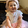 baby, bed, butterfly, child, clothing, cute, dress, happy, headband, indoor, infant, lace, person, pigtails, pink, plush_toy, portrait, sitting, smile, tutu