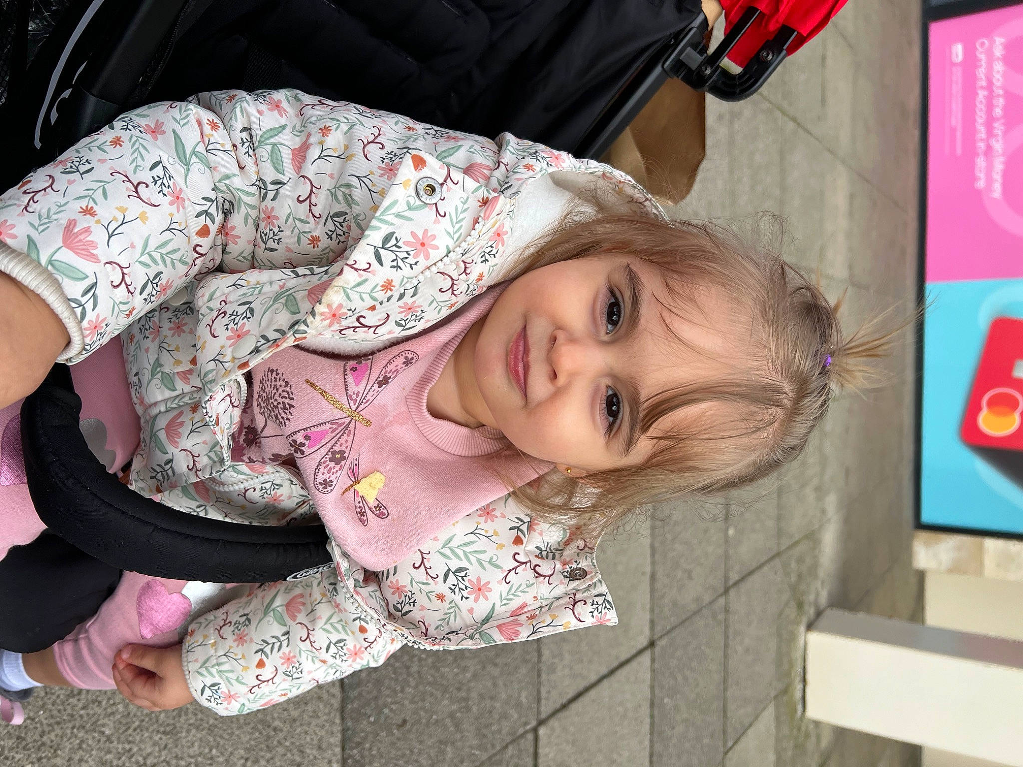 Aylin is registered to the contest to win money with this photo: beauty, child, facial_expression, fun, hairstyle, happy, joy, leisure, logo, magenta, pattern, person, photography, pink, sitting, skin, sleeve, smile, toddler, tree