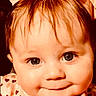Evelyn is registered to the contest to win money with this photo: baby, child, face, smile, blue_eyes, bow, hair, cute, portrait, infant, clothing, hand, closeup, happy, skin, expression, person, indoors, young, adorable