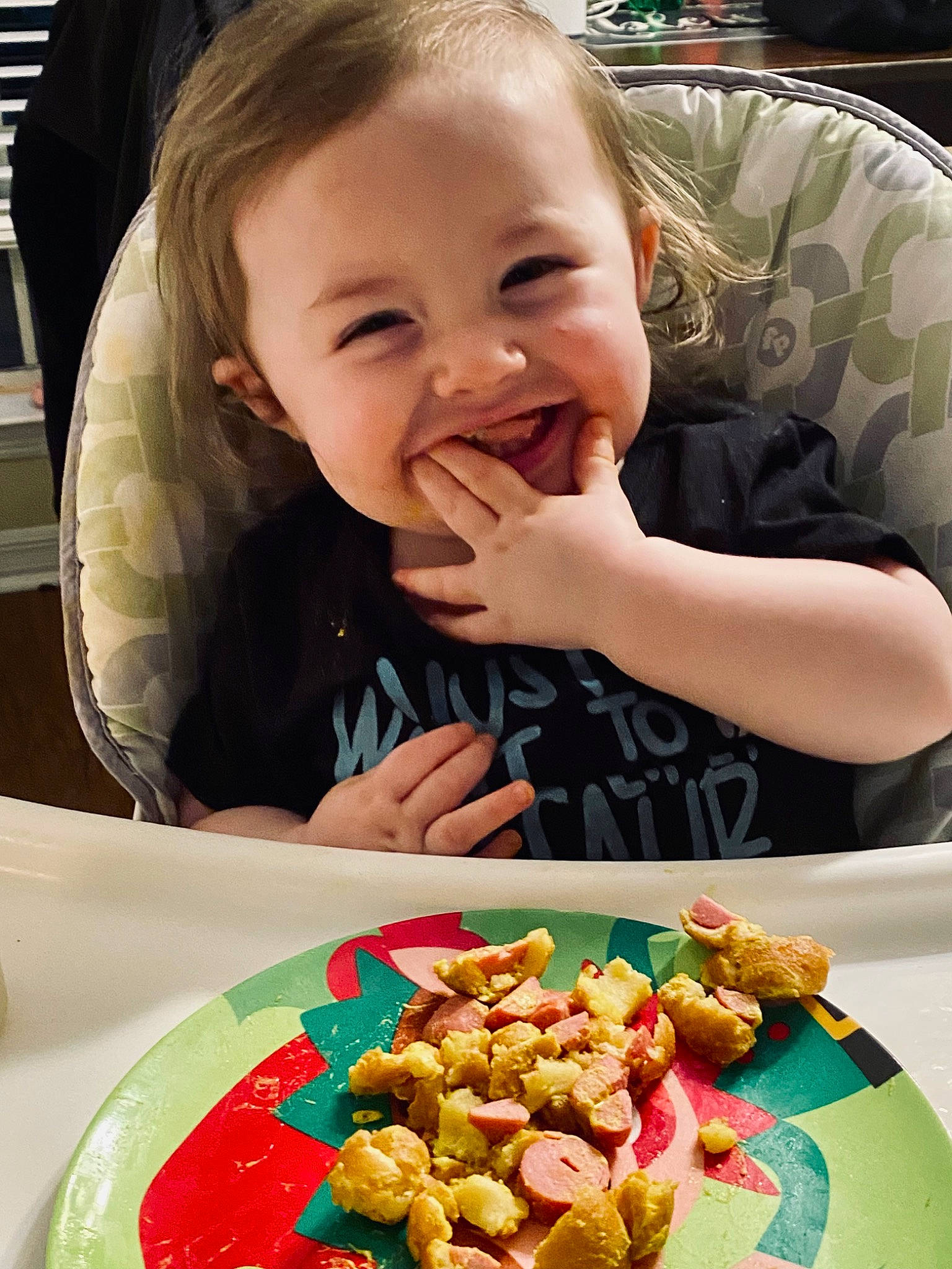 Levi is registered to the contest to win money with this photo: baby, chair, cheek, child, comfort_food, cuisine, dish, face, finger_food, food, food_craving, ingredient, joy, junk_food, person, plate, recipe, sharing, smile, sweetness