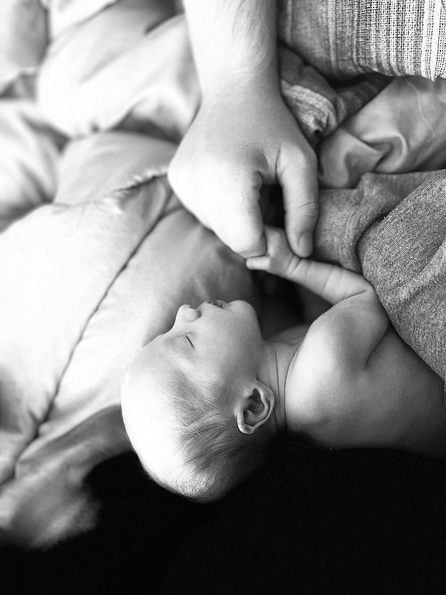 Olivia joined the competition — help win amazing prizes! accessories, adult, baby, bed, bodypart, couch, face, finger, furniture, hand, head, jewelry, male, man, newborn, person, photography, portrait, quilt, sleeping