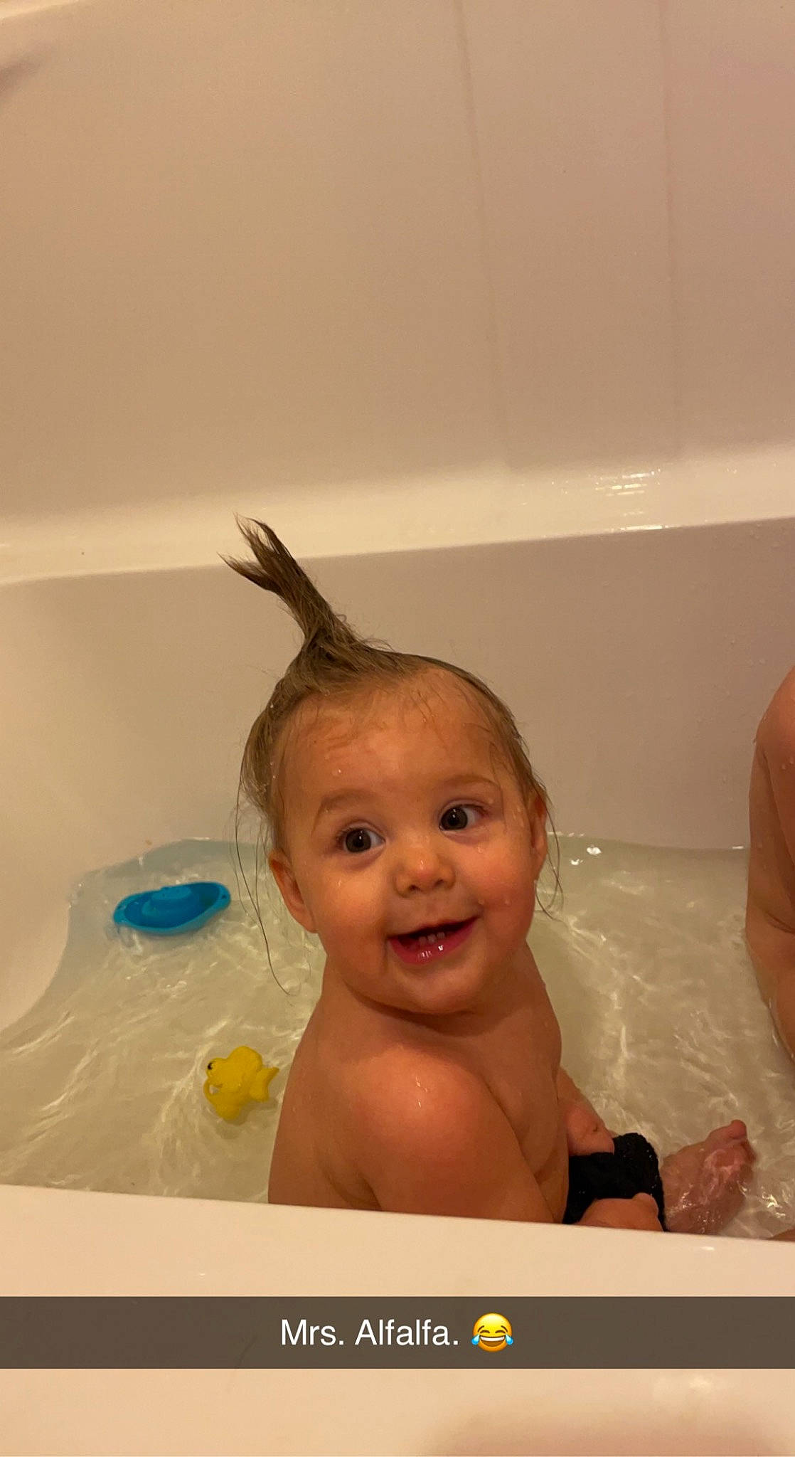 Kenzie is registered to the contest to win money with this photo: baby, baby_bathing, bath_toy, bathing, bathroom, bathtub, cheek, child, ear, fluid, fun, happy, joy, person, personal_care, plumbing, plumbing_fixture, room, smile, thumb