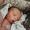 baby, sleeping, blanket, medical, electrodes, infant, face, peaceful, closeup, cushion, patterned, arm, resting, indoors, child, person, soft, comfort, newborn, skin