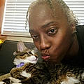 Tabitha E.
