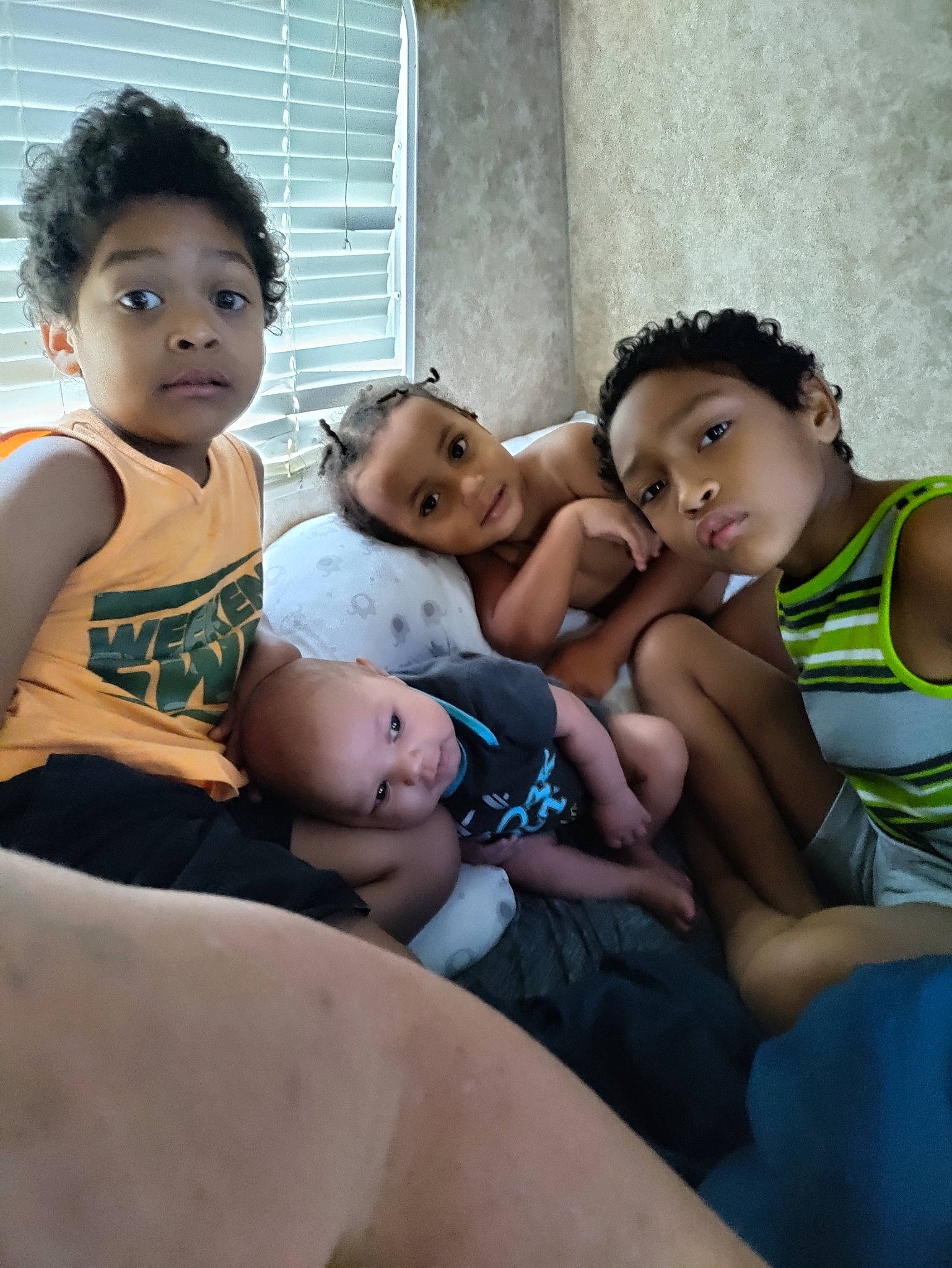 Manny joined the competition — help win amazing prizes! arm, black_hair, comfort, eye, face, flash_photography, fun, happy, head, human_body, leg, leisure, neck, people, person, shorts, skin, t_shirt, thigh, toddler