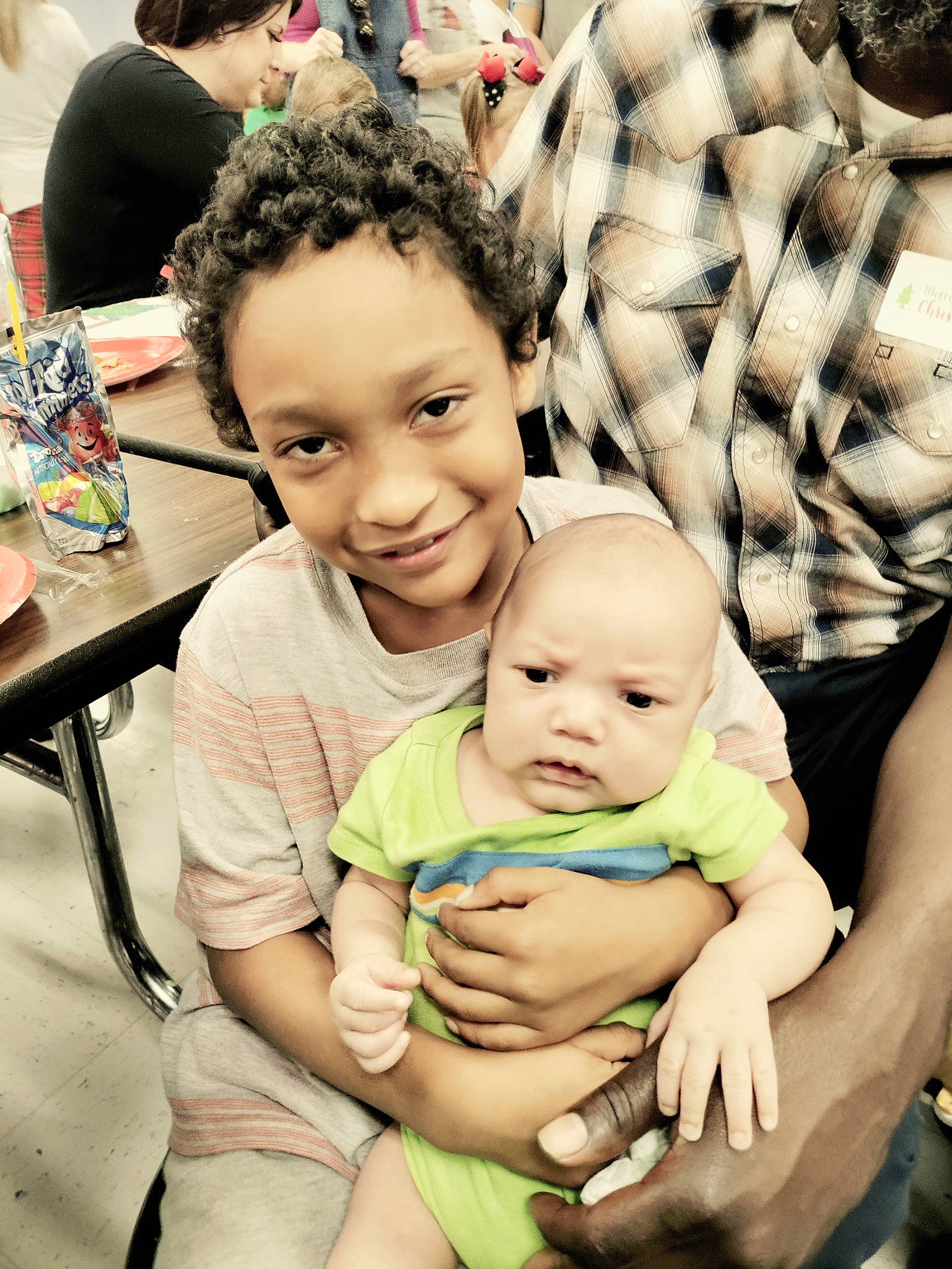 Brandon joined the competition — help win amazing prizes! adaptation, arm, chair, child, comfort, friendship, fun, furniture, green, hairstyle, happy, head, joy, person, photograph, sharing, skin, smile, snapshot, t_shirt