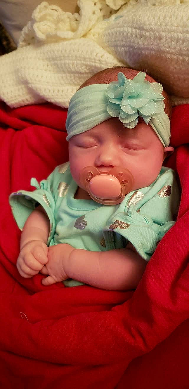 Jaylee is registered to the contest to win money with this photo: baby, baby_sleeping, birth, cheek, child, hand, headwear, joy, nap, person, sleep, toddler