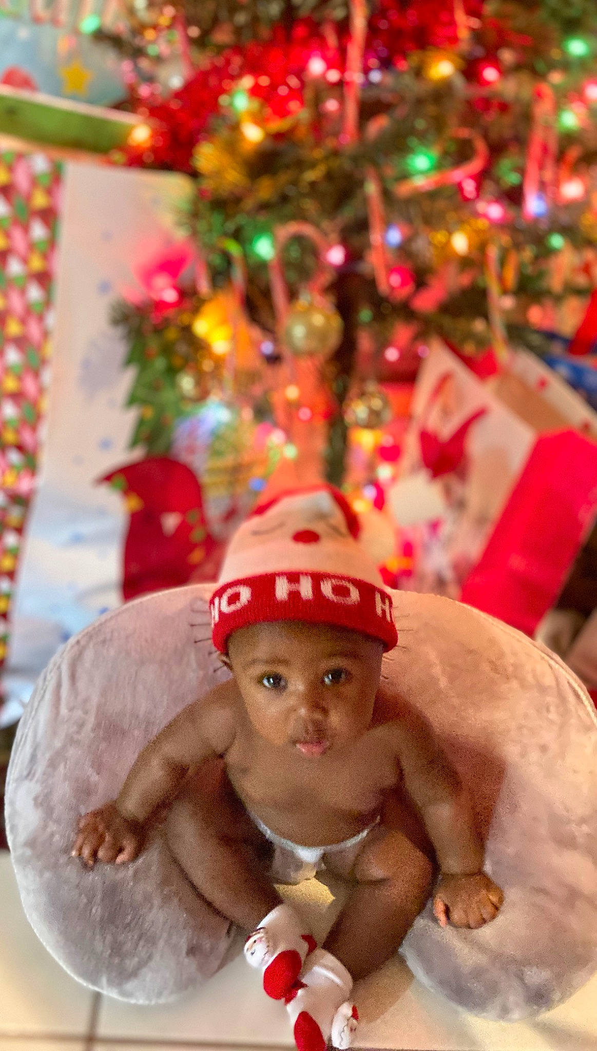 Leila joined the competition — help win amazing prizes! baby, cap, carmine, christmas, christmas_decoration, christmas_ornament, christmas_tree, costume_hat, event, fashion_accessory, happy, hat, headwear, holiday, holiday_ornament, interior_design, ornament, person, santa_claus, toddler