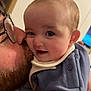 Ace joined the competition — help win amazing prizes! baby, man, glasses, beard, kiss, smile, indoor, affection, closeup, face, child, clothing, sleeve, button, person, holding, warmth, love, family, portrait