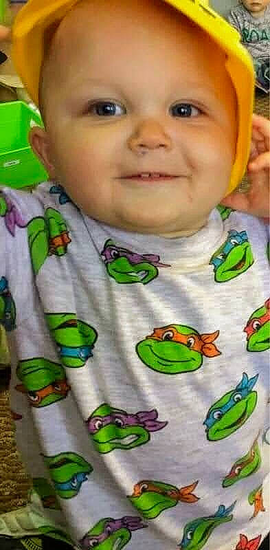 Cody is registered to the contest to win money with this photo: baby, baby_products, baby_toddler_clothing, cheek, child, collar, dress_shirt, fun, green, happy, joy, nose, pattern, person, product, skin, sleeve, smile, t_shirt, toddler