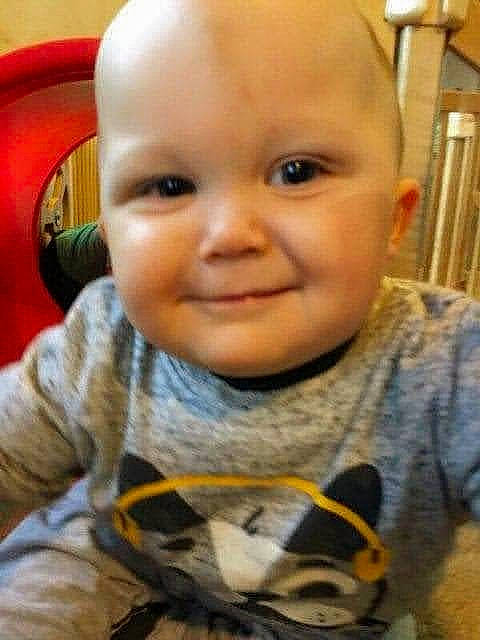 Cody is registered to the contest to win money with this photo: baby, baby_toddler_clothing, cheek, child, chin, ear, eyebrow, face, forehead, fun, happy, iris, joy, lip, mouth, nose, person, sitting, skin, sleeve