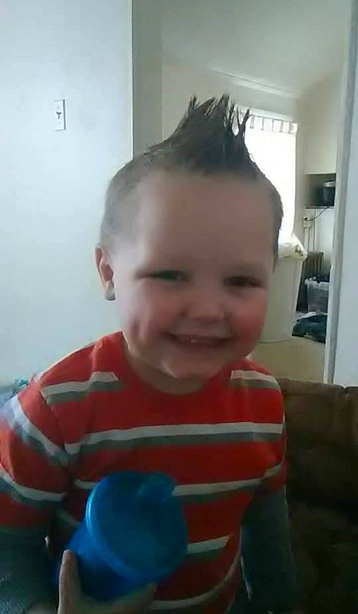 Charlie is registered to the contest to win money with this photo: baby_toddler_clothing, cheek, child, chin, ear, eyelash, forehead, fun, happy, hat, jaw, joy, liberty_spikes, mohawk_hairstyle, mouth, nose, person, sleeve, smile, sun_hat