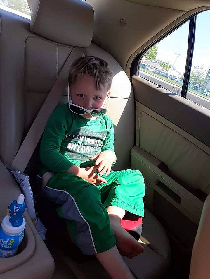 Charlie is registered to the contest to win money with this photo: auto_part, automotive_design, automotive_exterior, baby, car, car_seat, car_seat_cover, comfort, family_car, head_restraint, lap, leg, motor_vehicle, person, plant, seat_belt, steering_wheel, toddler, vehicle, vehicle_door