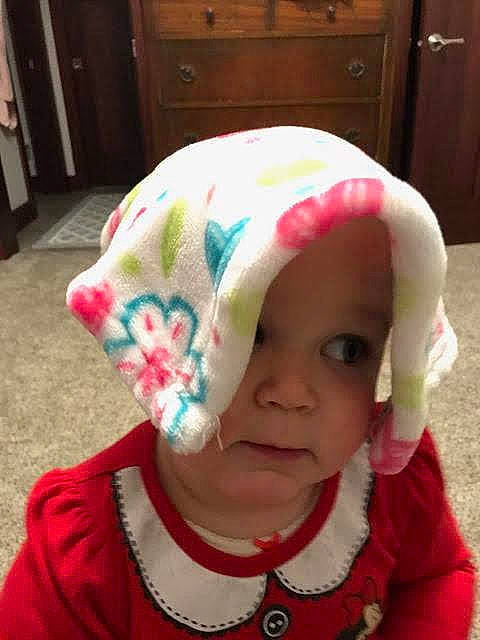 Carlie is registered to the contest to win money with this photo: baby, baby_toddler_clothing, cabinetry, cheek, child, cool, cupboard, drawer, eyebrow, fashion_accessory, fun, happy, headgear, jewellery, lip, magenta, pattern, person, pink, sleeve